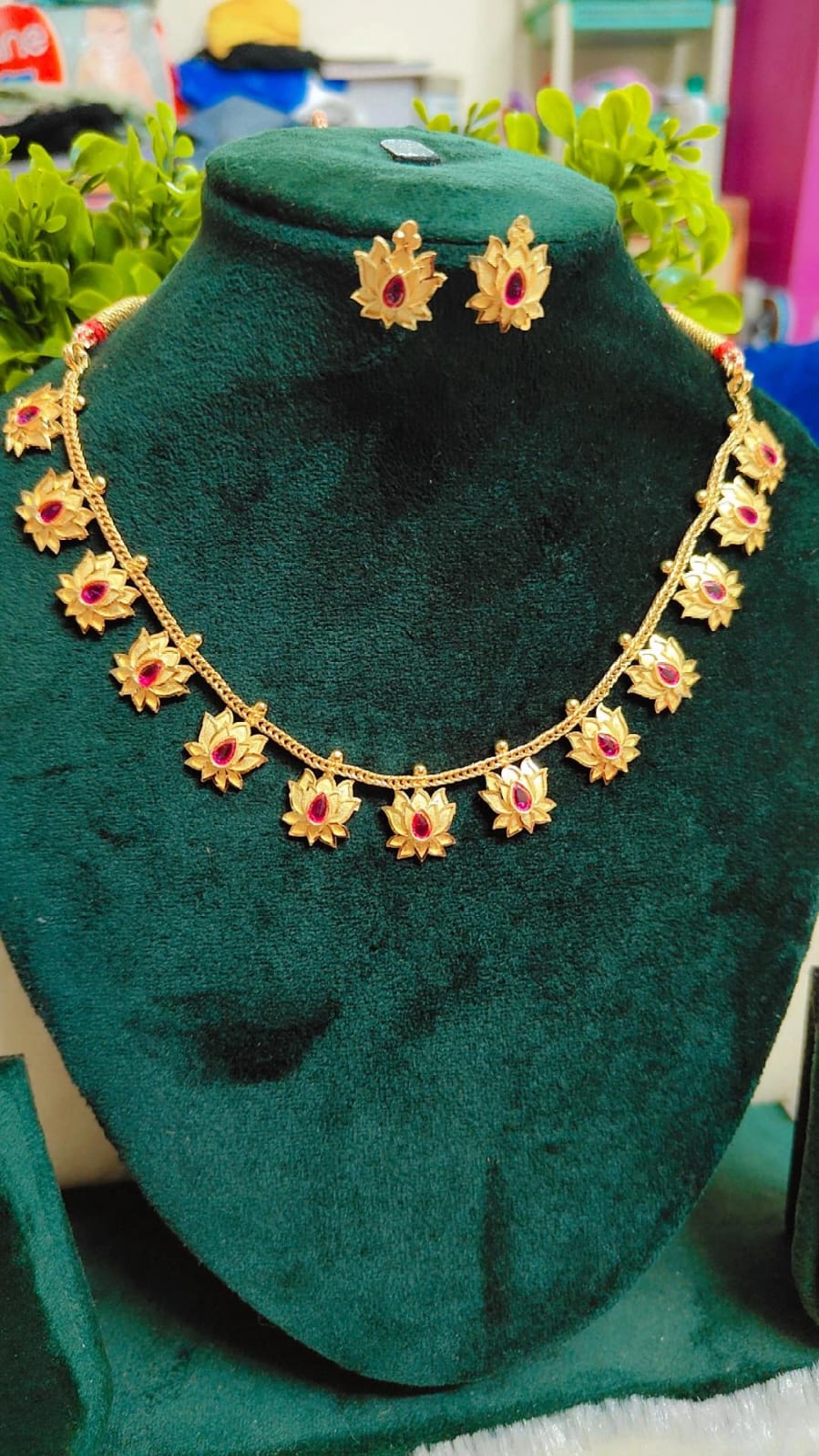 Lotus Gold Necklace with Ruby Accents