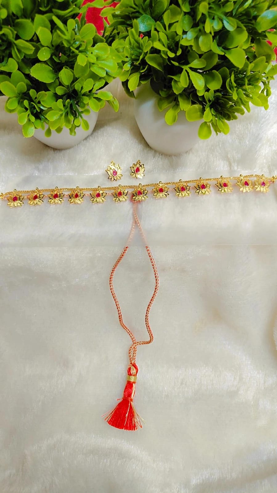 Lotus Gold Necklace with Ruby Accents