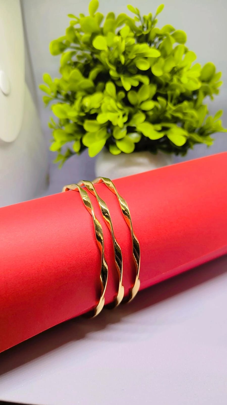 Elegant Gold-Tone Twisted Bangles ✨