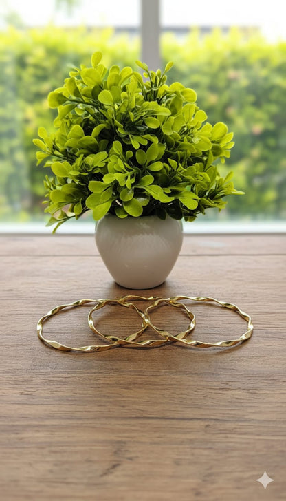 Elegant Gold-Tone Twisted Bangles ✨